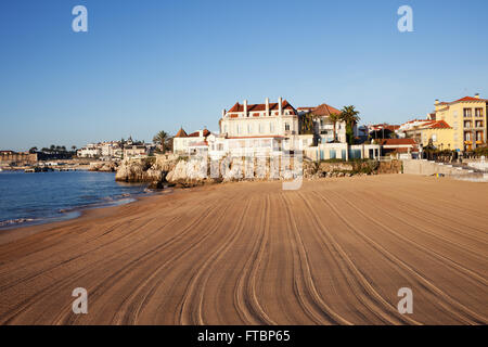 Portugal, resort town of Casccais, sunny beach by the Atlantic Ocean in the morning, vacation scenery Stock Photo