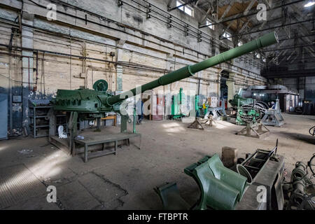 Workers repair tanks in a workshop at the Lviv Armor Plant Stock Photo