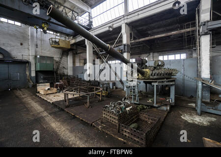 Workers repair tanks in a workshop at the Lviv Armor Plant Stock Photo