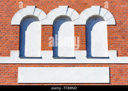 Ahus, Sweden - March 20, 2016: Architectural detail of the Absolut Company factory, the place where Absolut Vodka is made. Red b Stock Photo