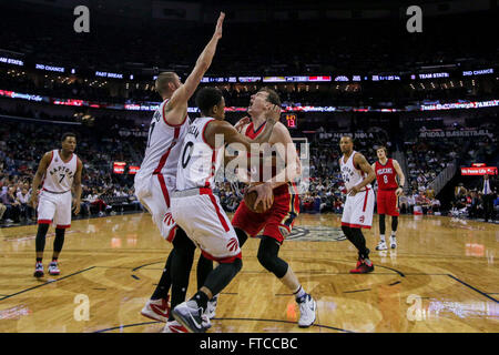 New Orleans, LA, USA. 26th Mar, 2016. New Orleans Pelicans center Omer Asik (3) is fouled by Toronto Raptors guard DeMar DeRozan (10) during an NBA basketball game between the Toronto Raptors and the New Orleans Pelicans at the Smoothie King Center in New Orleans, LA. Stephen Lew/CSM/Alamy Live News Stock Photo