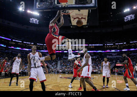 New Orleans, LA, USA. 26th Mar, 2016. New Orleans Pelicans forward Alonzo Gee (15) dunks the ball against Toronto Raptors guard DeMar DeRozan (10) during an NBA basketball game between the Toronto Raptors and the New Orleans Pelicans at the Smoothie King Center in New Orleans, LA. Stephen Lew/CSM/Alamy Live News Stock Photo