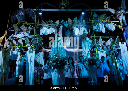 Filipino children dressed as angels participate at the Salubong-the traditional meeting of the Blessed Mother and the resurrected Christ-during the Easter Vigil celebration at Baclaran Church in Paranaque. Easter Vigil was held in the hours of darkness at the evening of Black Saturday until early morning of Easter Sunday. It begins with a Service of Light where an Easter fire is kindled and the Paschal Candle is blessed and lit that signifies Christ as the light and life. It will conclude with the Eucharistic celebration with the renewal of Baptismal promises. (Photo by Marlo Cueto/Pacific Pre Stock Photo