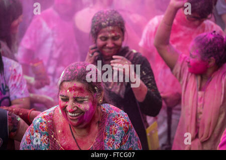 Bangkok, Bangkok, Thailand. 27th Mar, 2016. People covered in coloured powder take part in the yearly 'Indian Holi Festival' at Thammasat University Campus in Bangkok, Thailand on March 27, 2016. Holi, also known as the festival of colours or the festival of sharing love is a spring festival, mostly celebrate in India, but as well as many other countries with an Indian community such Bangkok. Credit:  Guillaume Payen/ZUMA Wire/Alamy Live News Stock Photo