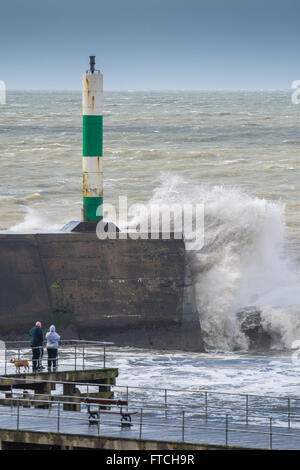 Aberystwyth Wales UK, Easter Sunday,  27 March 2016   UK Weather: Storm Katie brings strong winds and huge waves to batter the seaside at Aberystwyth on  Easter Sunday  The storm is projected to increase in severity, especially along the south facing coasts of England, with winds likely to gust up to 80mph in some places tomorrow    Credit:  keith morris/Alamy Live News Stock Photo