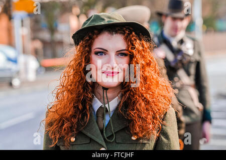 Belfast, Northern Ireland. 27 Mar 2016 - Connlaith Pickering wearing a reproduction military uniform from the Irish Civilian Army (ICA) at the 1916 Irish Easter Rising centenary celebration parade. Credit:  Stephen Barnes/Alamy Live News Stock Photo