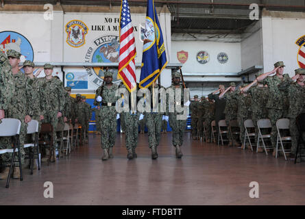 150422-NB694-050 NAVAL AIR STATION SIGONELLA, Italy (April 22, 2015) Sailors assigned the Golden Swordsmen of Patrol Squadron (VP) 47 salute the colors during a change of command ceremony for VP-47 April 22, 2015. VP-47 is conducting naval operations in the U.S. 6th Fleet area of operations in support of U.S. national security interests in Europe. (U.S. Navy photo by Mass Communication Specialist 2nd Class Joshua E. Walters/Released) Stock Photo