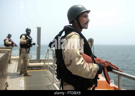 150422-N-RB579-097 ATLANTIC OCEAN (April 22, 2015) Mauritanian maritime forces conduct visit, board, search and seizure training aboard the Military Sealift Command's joint high-speed vessel USNS Spearhead (JHSV 1) in support of Exercise Saharan Express 2015, April 22. Saharan Express is a U.S. Africa Command-sponsored multinational maritime exercise designed to increase maritime safety and security in the waters of West Africa. (U.S. Navy photo by Mass Communication Specialist 1st Class Joshua Davies/Released) Stock Photo