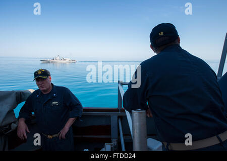 150601-N-FQ994-420 BLACK SEA (June 1, 2015) Cmdr. Russell Caldwell, executive officer of USS Ross (DDG 71), left, and Cmdr. Tadd Gorman, commanding officer, observe the Ukrainian navy Frigate Hetman Sahaydachniy (U 130) maneuvering with the ship during a underway exercise June 1, 2015. Ross, an Arleigh Burke-class guided-missile destroyer, forward-deployed to Rota, Spain, is conducting naval operations in the U.S. 6th Fleet area of operations in support of U.S. national security interests in Europe. (U.S. Navy photo by Mass Communication Specialist 3rd Class Robert S. Price/Released) Stock Photo