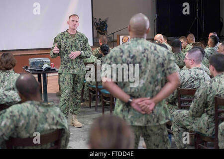 150603-N-OX801-381 CAMP LEMONNIER, Djibouti (June 3, 2015) Naval Forces Europe-Africa Fleet Master Chief Steven Giordano, left, answers a question from Master-at-Arms 1st Class Jose Soto, from Orlando Florida, at an all-hands call during Giordano's visit to Camp Lemonier in Djibouti, Africa, June 3, 2015. Giordano's visit to Camp Lemonnier and Combined Joint Task Force-Horn of Africa locations served to better understand the commands' quality of work and quality of life, as well as recognizing exemplary Sailors within each command. (U.S. Navy photo by Mass Communication Specialist 2nd Class Da Stock Photo