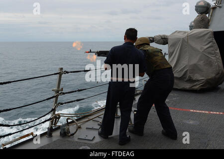 150629-N-XB010-096 BLACK SEA (June 29, 2015) Interior Communications Electrician 3rd Class Brandon Bixler, from Hampton Roads, Virginia, shoots an M240 machine gun during a qualification gun shoot aboard USS Laboon (DDG 58) June 29, 2015. Laboon, an Arleigh Burke-class guided-missile destroyer, homeported in Norfolk, is conducting naval operations in the U.S. 6th Fleet area of operations in support of U.S. national security interests in Europe. (U.S. Navy photo by Mass Communication Specialist 3rd Class Desmond Parks) Stock Photo