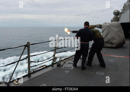 150629-N-XB010-109 BLACK SEA (June 29, 2015) Interior Communications Electrician 3rd Class Brandon Bixler, from Hampton Roads, Virginia, shoots an M240 machine gun during a qualification gun shoot aboard USS Laboon (DDG 58) June 29, 2015. Laboon, an Arleigh Burke-class guided-missile destroyer, homeported in Norfolk, is conducting naval operations in the U.S. 6th Fleet area of operations in support of U.S. national security interests in Europe. (U.S. Navy photo by Mass Communication Specialist 3rd Class Desmond Parks) Stock Photo