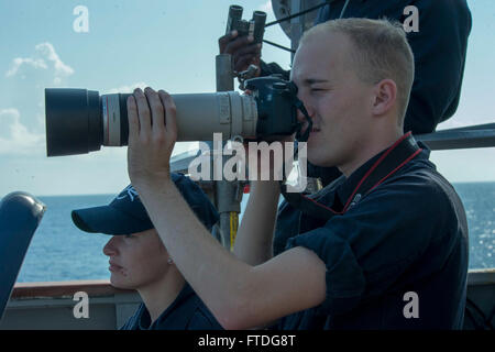 151009-N-TC720-093 MEDITERRANEAN SEA (Oct. 9, 2015) Culinary Specialist Seaman Drew Snodgrass, from Kansas City, Missouri, documents activity aboard USS Donald Cook (DDG 75) Oct. 9, 2015. Donald Cook, an Arleigh Burke-class guided-missile destroyer, forward deployed to Rota, Spain is conducting a routine patrol in the U.S. 6th Fleet area of operations in support of U.S. national security interests in Europe. (U.S. Navy photo by Mass Communication Specialist 3rd Class Mat Murch/Released) Stock Photo