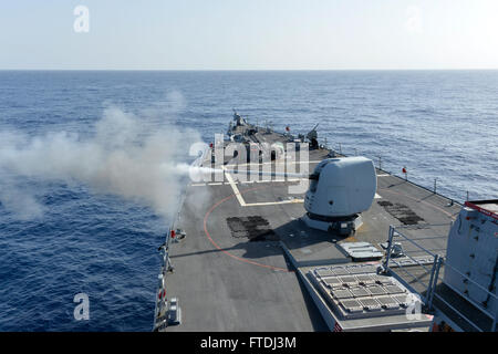 Guided-missile destroyer Ross fires a missile from the SeaRAM close-in ...