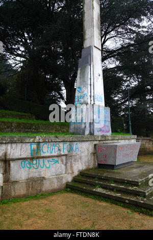 Aborto livre / free abortion protest graffiti on base of Cruz de los Caidos monument to those who died in the Spanish Civil War, Vigo, Galicia, Spain Stock Photo