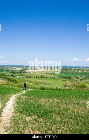 A landscape of hills under blue sky Stock Photo - Alamy