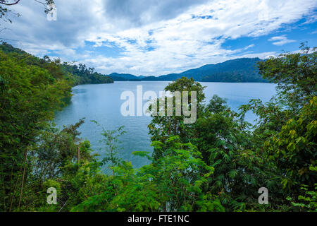 Tropical lake, forest and islands in cloudy blue sky. Belum resort, Banding, Temenggor Lake. Malaysia Stock Photo