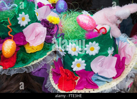 Decorated Easter bonnet hat parade, creative arts and crafts design, hat creations, egg-citing competition, fun Easter crowns, decorative toppers, designs & skills, egg-sellent entry on Easter Monday in Avenham Park, Preston, Lancashire, UK Stock Photo