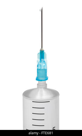 Large Syringe with Needle and Drop Isolated on White Background. Stock Photo