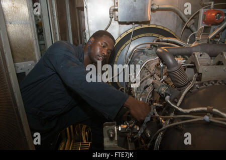 AKSAZ, Turkey (Nov. 11, 2013) - Gas Turbine Systems Technician (Mechanical) 3rd Class Quazavier Henderson replaces a compressor discharge censor on the generator after completing a generator water wash aboard the Arleigh Burke-class guided-missile destroyer USS Stout (DDG 55) while inport on Aksaz Naval Base, to support Exercise Dogu Akdeniz 2013. The exercise was hosted by Commander, Turkish Fleet to support interoperability efforts. Stout, homeported in Norfolk, Va., is on a scheduled deployment supporting maritime security operations and theater security cooperation efforts in the U.S. 6th  Stock Photo