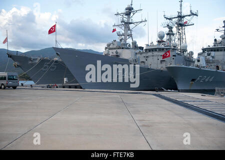 AKSAZ, Turkey (Nov. 11, 2013) - From left to right, the Arleigh Burke-class guided-missile destroyer USS Stout (DDG 55), and the Turkish frigates TCG Giresun (F 491) and TCG Barbaros (TCG 244) are all moored at Aksaz Naval Base while participating in Exercise Dogu Akdeniz 2013. The exercise was hosted by Commander, Turkish Fleet to support interoperability efforts. Stout, homeported in Norfolk, Va., is on a scheduled deployment supporting maritime security operations and theater security cooperation efforts in the U.S. 6th Fleet area of operation. (U.S. Navy photo by Mass Communication Special Stock Photo