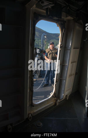 Aksaz, Turkey (Nov. 12, 2013) - Gunner's Mate 3rd Class Charles Chance mans a M2HB .50-caliber machine gun aboard the Arleigh Burke-class guided-missile destroyer USS Stout (DDG 55) while departing Aksaz Naval Base, to support Exercise Dogu Akdeniz 2013. The exercise was hosted by Commander, Turkish Fleet to support interoperability efforts. Stout, homeported in Norfolk, Va., is on a scheduled deployment supporting maritime security operations and theater security cooperation efforts in the U.S. 6th Fleet area of operation. (U.S. Navy photo by Mass Communication Specialist 2nd Class Amanda R.  Stock Photo