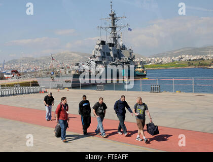 140228-N-CH661-003 PIRAEUS, Greece (Feb. 28, 2014) - Sailors, assigned to the guided-missile destroyer USS Ramage (DDG 61), disembark the ship during a routine port visit. Ramage, homeported in Norfolk, Va., is on a scheduled deployment supporting maritime security operations and theater security cooperation efforts in the U.S. 6th Fleet area of operations. (U.S. Navy photo by Mass Communication Specialist 2nd Class Jared King/Released)  Join the conversation on Twitter ( https://twitter.com/naveur navaf )  follow us on Facebook ( https://www.facebook.com/USNavalForcesEuropeAfrica )  and while Stock Photo