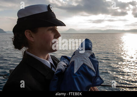 1400309-N-PJ969-021 AKSAZ, Turkey (March 09, 2014) Sonar Technician (Surface) 3rd Class Kendal Clawson prepares for colors aboard the guided-missile cruiser USS Philippine Sea (CG 58) as it moors in Aksaz, Turkey. Philippine Sea is on a scheduled deployment supporting maritime security operations and theater security cooperation efforts in the U.S. 6th fleet area of responsibility. (U.S. Navy photo by Mass Communication Specialist 3rd Class Abe McNatt/Released) Stock Photo
