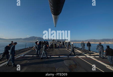 PALERMO, Italy (April 1, 2014) - Sailors aboard the guided-missile destroyer USS Mason (DDG 87) make preparations for entering port at Palermo, Italy. Mason, as part of the Harry S. Truman Carrier Strike Group, is operating in the U.S. 6th Fleet area of operations in support of maritime security operations and theater security cooperation efforts as it completes a 9-month deployment to the U. S. 6th and 5th Fleet areas of operations Stock Photo