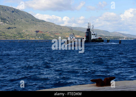 140418-N-JE719-036 SOUDA BAY, Greece (April 18, 2014) – The Los Angeles-class submarine USS San Juan (SSN 751) arrives at Marathi NATO pier facility for a port visit. San Juan is on a scheduled deployment supporting maritime security operations and theater security cooperation efforts in the U.S. 6th Fleet area of operations. (U.S. Navy photo by Mass Communication Specialist 2nd Class Jeffrey M. Richardson/Released) Join the conversation on Twitter ( https://twitter.com/naveur navaf )  follow us on Facebook ( https://www.facebook.com/USNavalForcesEuropeAfrica )  and while you're at it check us Stock Photo