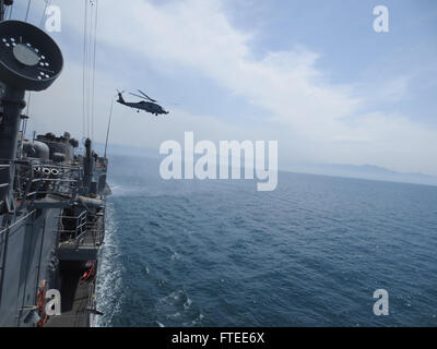 140510-N-NZ411-001 BLACK SEA (May 10, 2014) - Cutlass 471, a MH-60R Sea Hawk Helicopter, takes off from the guided-missile frigate USS Taylor (FFG 50). Taylor, homeported in Mayport, Fla., is deployed in a multi-mission role in the U.S. 6th Fleet area of operations to contribute to regional maritime security and to support NATO operations and deployments throughout the region. (U.S. Navy photo by Lt. j.g. David Hancock/Released)   Join the conversation on Twitter ( https://twitter.com/naveur navaf )  follow us on Facebook ( https://www.facebook.com/USNavalForcesEuropeAfrica )  and while you're Stock Photo