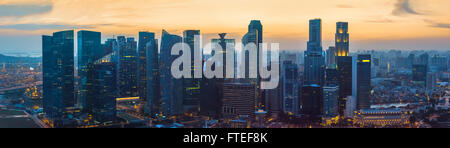 Skyscrapers of Singapore downtown at sunset, aerial view Stock Photo