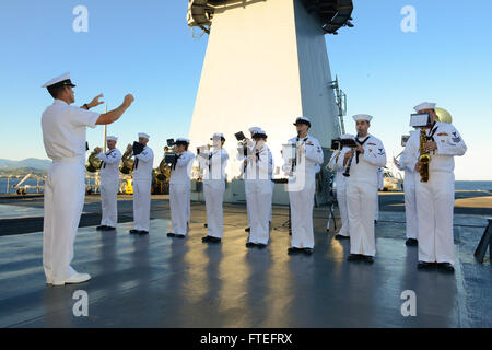 140813-N-UE250-323 GULF OF NAPOULE (Aug. 13, 2014) The U.S. Naval Forces Europe Band play the French national anthem during a reception aboard the U.S. 6th Fleet command and control ship USS Mount Whitney (LCC 20), anchored off the coast of Theoule-sur-Mer, France. Mount Whitney, homeported in Gaeta, Italy, is in Theoule-sur-Mer to participate in the commemoration of the 70th Anniversary of Operation Dragoon, which led to the liberation of southern France by Allied Forces during World War II.(U.S. Navy photo by Mass Communication Specialist 2nd Class Corey Hensley/Released) Stock Photo