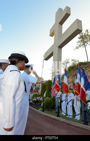 140814-N-UE250-186 THEOULE-SUR-MER, France (Aug. 14, 2014) - Sailors assigned to the U.S. 6th Fleet command and control ship USS Mount Whitney (LCC 20) join members of the French Veterans Organization in rendering honors during the playing of the French national anthem during a wreath laying ceremony at the Cross of Lorraine. Mount Whitney was in Theoule-sur-Mer to participate in the commemoration of the 70th Anniversary of Operation Dragoon, which led to the liberation of southern France by Allied Forces during World War II. (U.S. Navy photo by Mass Communication Specialist 2nd Class Corey He Stock Photo