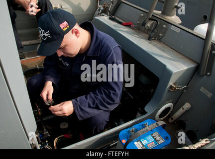 150610-N-BS486-012 NAVAL STATION ROTA, Spain (June 10, 2015) – Electrician’s Mate Fireman Lukas Struszczyk works on reinstalling a battery aboard a rigid hull inflatable boat aboard USS Donald Cook (DDG 75). Donald Cook, an Arleigh Burke-class guided-missile destroyer, forward-deployed to Rota, Spain, is conducting naval operations in the U.S. 6th Fleet area of operations in support of U.S. national security interests in Europe.(U.S. Navy photo by Mass Communication Specialist 2nd Class Grant Wamack/Released) Stock Photo