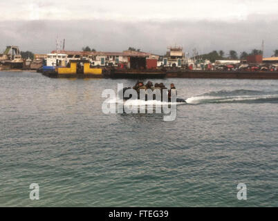 A reconnaissance rubber craft travels towards shore carrying U.S. and Gabonese Marines during an amphibious-landing exercise at Marine Nationale Naval Base, Port Gentil, Gabon, Sept. 1, 2014. Special-Purpose Marine Air-Ground Task Force Africa is conducting a joint training engagement in Gabon as part of Africa Partnership Station 14, a maritime-security exercise with international partners along the west coast of Africa led by U.S. Naval Forces Africa.  (Courtesy photo by Pfc. Sean O’Connor) Stock Photo