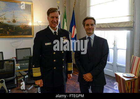 NAPLES, Italy (Oct. 6, 2014) Adm. Mark Ferguson, commander, Allied Joint Force Command, Naples/U.S. Naval Forces Europe-Africa, stands with the Honorable Stefano Caldoro, President of Campania Region, Italy.  Ferguson met with Caldoro to express the United States' gratitude for Italian host nation support and his commitment to strengthening the alliance between the two nations. Stock Photo