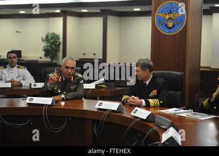 : NAPLES, Italy (Oct. 15, 2013) - Chief of the Hellenic Armed Forces General Staff, Gen. Mikhail Kostarakos, left, speaks with Adm. Bruce Clingan, commander, U.S. Naval Forces Europe-Africa, during his visit to Naval Support Activity Naples, Capodichino. Stock Photo