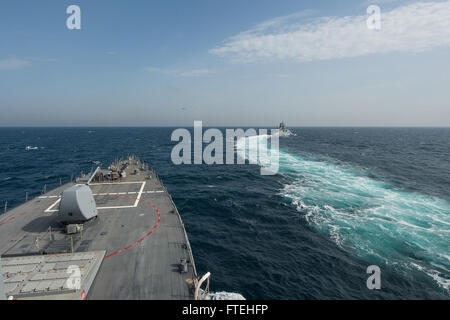 BLACK SEA (Oct. 16, 2014) – The Turkish navy Barbaros-class frigate TCG Salihreis (F 246) conducts division tactics with the Arleigh Burke-class guided-missile destroyer USS Cole (DDG 67) during a passing exercise. Cole, homeported in Norfolk, Va., is conducting naval operations in the U.S. 6th Fleet area of operations in support of U.S. national security interests in Europe. Stock Photo