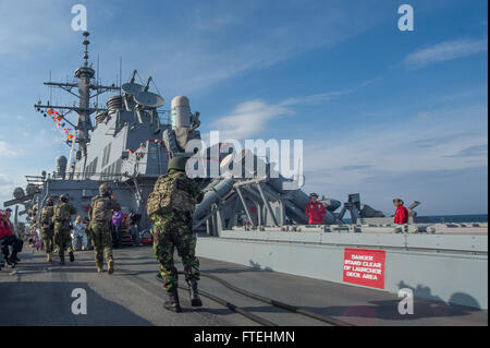 BLACK SEA (October 23, 2014) – Romanian navy special forces conduct a visit, board, search, and seizure exercise aboard the Arleigh Burke-class guided-missile destroyer USS Cole (DDG 67). Cole, homeported in Norfolk, Va., is conducting naval operations in the U.S. 6th Fleet area of operations in support of U.S. national security interests in Europe. Stock Photo