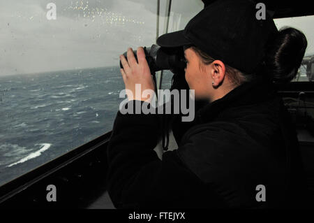 150106-N-WS581-041 MEDITERRANEAN SEA (Jan. 6, 2015) Seaman Carli Krueger, from Ogden, Utah, stands the starboard lookout watch aboard the San Antonio-class amphibious transport dock ship USS New York (LPD 21), Jan. 6, 2015. New York, part of the Iwo Jima Amphibious Ready Group/24th Marine Expeditionary Unit, is conducting naval operations in the U.S. 6th Fleet area of operations in support of U.S. national security interests in Europe. (U.S. Navy photo by Mass Communications Specialist 3rd Class Andrew J. Sneeringer/ Released) Stock Photo