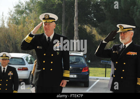 150112-N-UI568-017 NAVAL STATION ROTA, Spain (Jan. 12, 2015) Vice Adm. James Foggo, commander, U.S. 6th Fleet, center, renders honors during an office call visit with Spanish navy Adm. Santiago Bolibar Piñeiro, Spanish admiral of the fleet, left, Jan. 12, 2015. Foggo’s two-day visit to Rota involved tours to various facilities aboard the installation and meetings with the Spanish navy. (U.S. Navy photo by Morgan Over/Released) Stock Photo