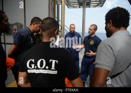 This photograph shows members of the Cabo Verde Coast Guard meeting U.S ...