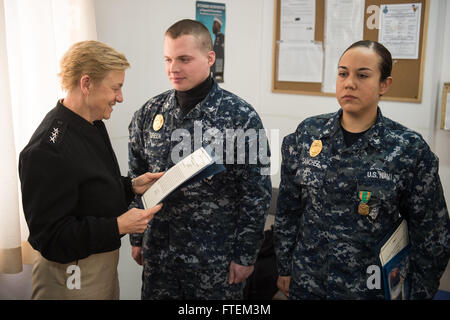 DEVESELU, Romania (Feb. 21, 2015) Deputy Commander, U.S. Fleet Forces Command, Vice Adm. Nora W. Tyson presents awards to Sailors during an all hands call at Naval Support Facility (NSF) Deveselu Feb. 21, 2015. NSF Deveselu is Navy Region Europe Africa Southwest Asia’s latest tool for providing efficient and effective shore service support to United States and Allied Forces operating in Europe, Africa and Southwest Asia. Stock Photo