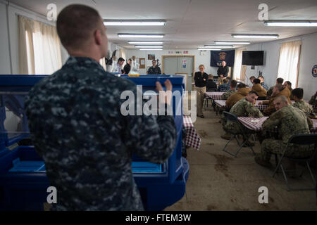 DEVESELU, Romania (Feb. 21, 2015) Deputy Commander, U.S. Fleet Forces Command, Vice Adm. Nora W. Tyson fields questions during an all hands call at Naval Support Facility (NSF) Deveselu Feb. 21, 2015. NSF Deveselu is Navy Region Europe Africa Southwest Asia’s latest tool for providing efficient and effective shore service support to United States and Allied Forces operating in Europe, Africa and Southwest Asia. Stock Photo