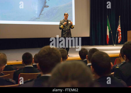 POZZUOLI, Italy  Adm. Mark Ferguson, U.S. Naval Forces Europe-Africa commander, answers a question from an Italian military member during his visit to the Accademia Aeronautica in Pozzuoli, Italy, Feb. 23, 2015. During his visit, Ferguson delivered remarks to military members at the Accademia Aeronautica, which focused on the importance of leadership, cross-cultural communication and adapting to a dynamic and changing world. Stock Photo