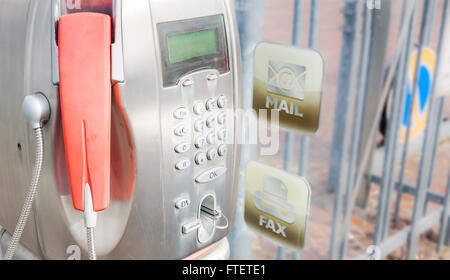 Old public pay phone, no longer in operation. Stock Photo