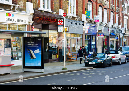 Barnes Village,Food,Cafes,Shops,Estate Agents,Barnes Pond,Green,Pubs,Bulls Head Jazz Venue,Thames River, High Street,London,UK Stock Photo