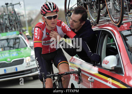 Deinze, Belgium. 27th Mar, 2016. BENOOT Tiesj (BEL) Rider of LOTTO SOUDAL has problems with his radio during the Flanders Classics UCI World Tour 78nd Gent-Wevelgem cycling race with start in Deinze and finish in Wevelgem © Action Plus Sports/Alamy Live News Stock Photo