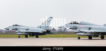 Typhoon pair sit on the end of the runway at RAF Coningsby waiting to depart. Stock Photo